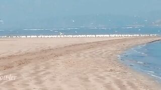 Tik Tok Topless Girl Walking on the Public Beach in Wet Sand