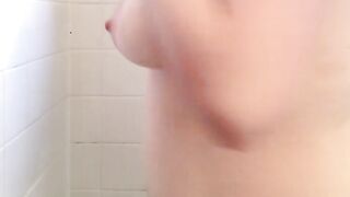 Amateur Massages her different Sized Tits with Oil in the Shower