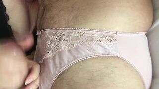 Jerked off wearing her pink panties