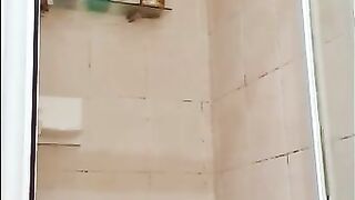 Cute Girl Stripping and taking a Shower