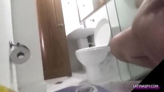 MILF with huge ass takes off pants in the bathroom