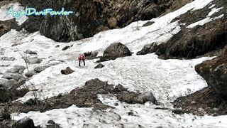 Sexy Blonde Takes a Walk in Snow