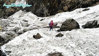 Sexy Blonde Takes a Walk in Snow