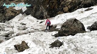 Sexy Blonde Takes a Walk in Snow