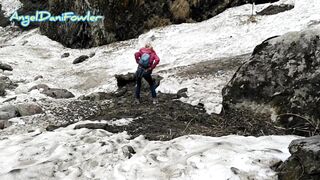 Sexy Blonde Takes a Walk in Snow