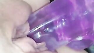 Riding purple dildo