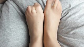 CUTE FEET IN NYLONS TAKE A LOAD OF CUM