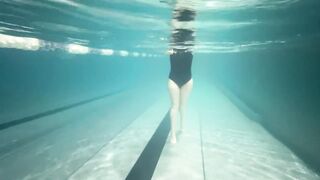 cutie swims in the pool