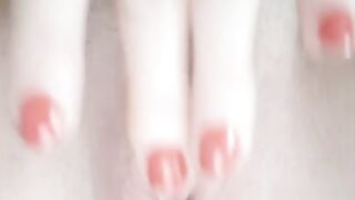 Red nails finger in petite, natural, pink Eastern European pussy.