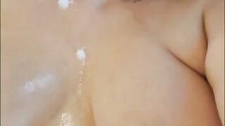 POV I play with your cum. I beg you to fuck me again. Big huge tits showered in cum