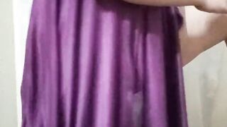 Pakistani wife is playing with her milky body in a pink nightie and removing her clothes and showing her panty and bra a