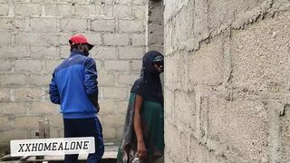 Big-titted Nigerian slut fucking in an uncompleted building.