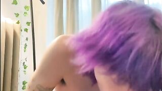 Rainbow dildo blowjob