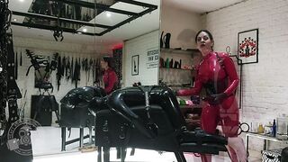 Progressive Anal Training for Rubber Slave - Lady Bellatrix with her strap-on in catsuit (teaser)