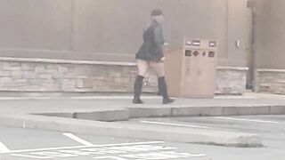 MILF in short mini skirt and fishnets walking in public