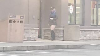 MILF in short mini skirt and fishnets walking in public