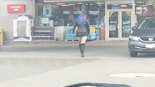 MILF in short mini skirt and fishnets walking in public