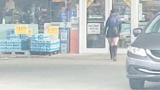 MILF in short mini skirt and fishnets walking in public