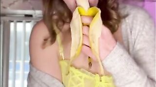 Hungry sexy MILF eating a banana