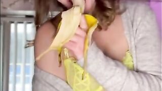 Hungry sexy MILF eating a banana