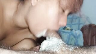 his wet balls smear my face with cum, i suck hard and loud until he ejaculates in my mouth again