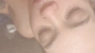 HORNY TATTOOED BRUNETTE SUCKS COCK AND SWALLOWS CUM IN THE SHOWER