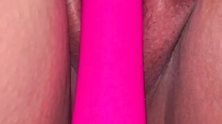 Red nails holding pussy with a vibration for orgasm