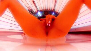 Pussy masturbation in The sunbed