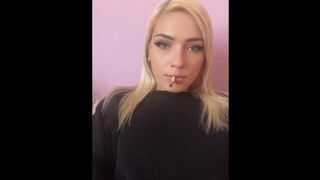 Sexy blonde girl smoke a cigarette