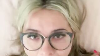 Blonde in sexy glasses take cum in mouth