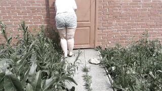 Morning pissing of a mature bbw milf in a rural street toilet.