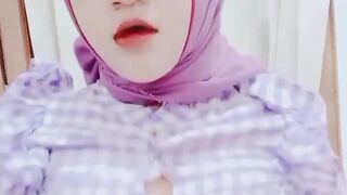 Kuala Lumpur Woman's Viral Purple Hijab Squeezes Her Breasts and Masturbates