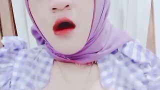 Kuala Lumpur Woman's Viral Purple Hijab Squeezes Her Breasts and Masturbates