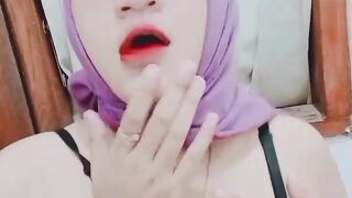 Kuala Lumpur Woman's Viral Purple Hijab Squeezes Her Breasts and Masturbates