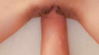 Fisting a teen's shaved pussy close up