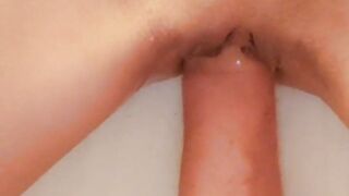 Fisting a teen's shaved pussy close up