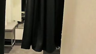 Whore gets fucked with a dildo in a public changing room