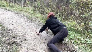 girl in high-heeled boots wants to go to home, but there is dirty slippery slide on the way